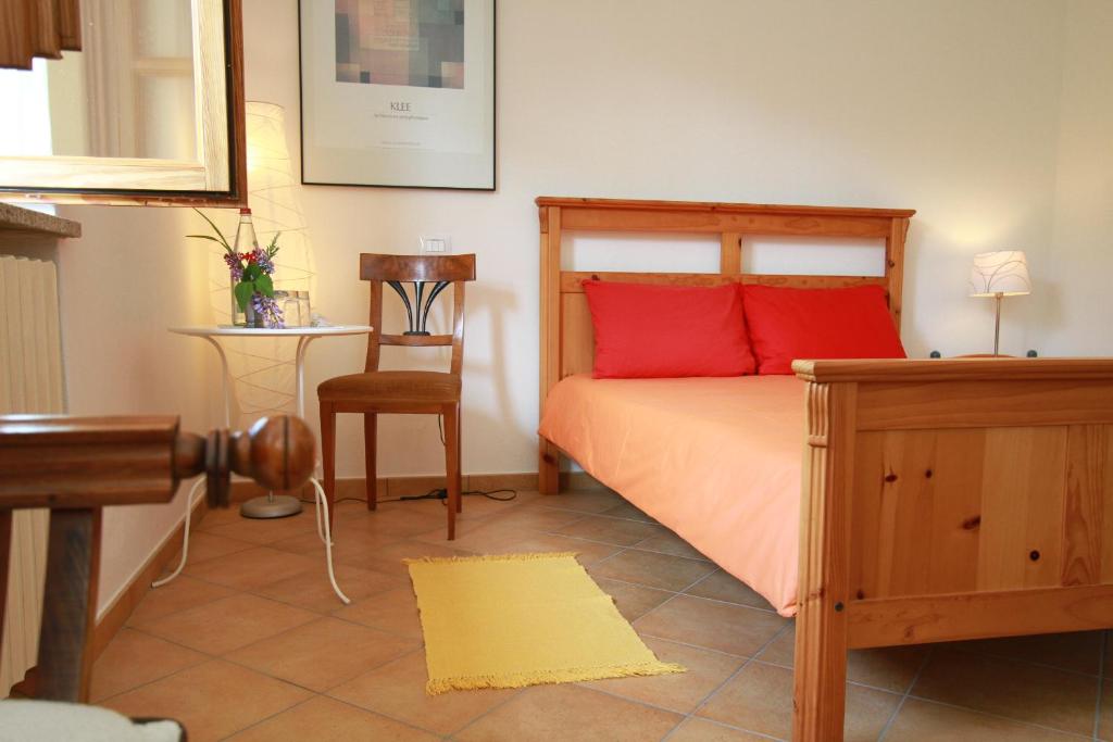 Postel nebo postele na pokoji v ubytování Casa Calendula