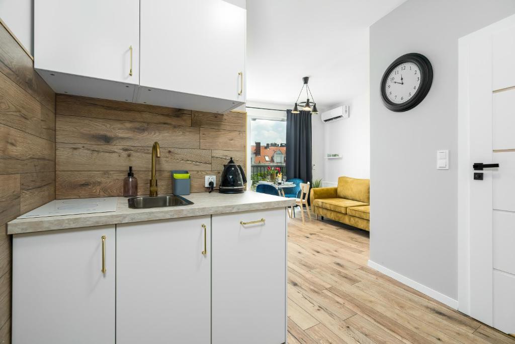 Kuchyňa alebo kuchynka v ubytovaní Apartments City View Garbary by Noclegi Renters