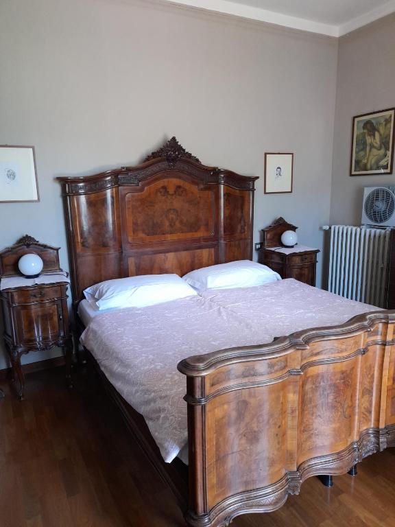 Postel nebo postele na pokoji v ubytování Albergo Milano 1920