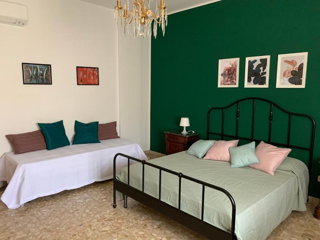 Postel nebo postele na pokoji v ubytování B&B Fiorisol