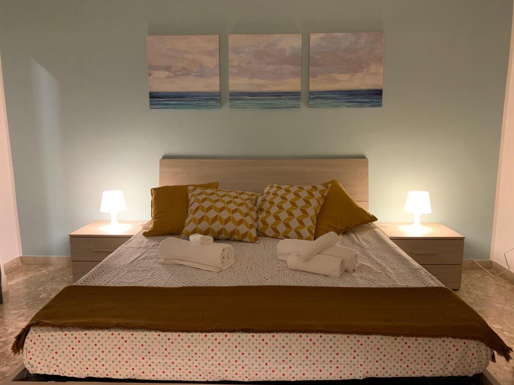 Postel nebo postele na pokoji v ubytování B&B Fiorisol