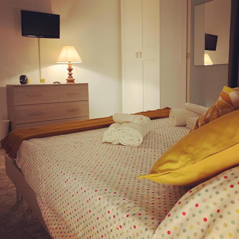 Postel nebo postele na pokoji v ubytování B&B Fiorisol