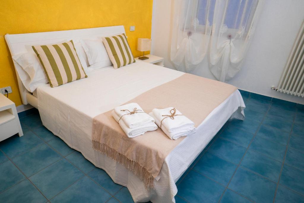 Postel nebo postele na pokoji v ubytování Casa Junno