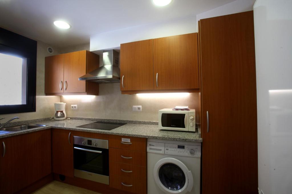 Kuchyň nebo kuchyňský kout v ubytování Apartaments Turístics Prat de Les Mines
