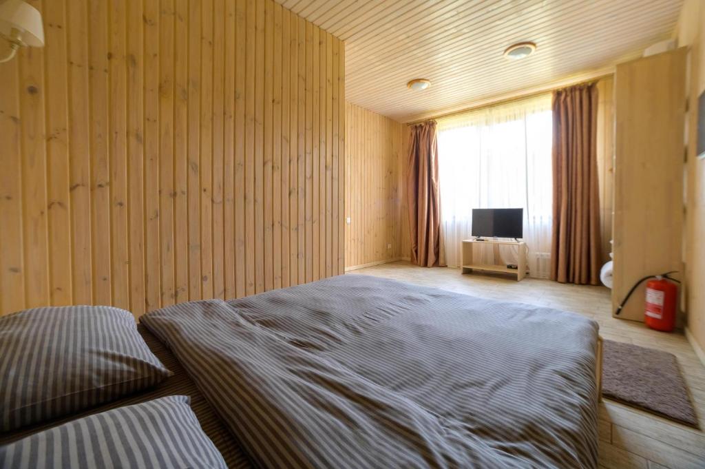 TV a/nebo společenská místnost v ubytování Prichal 80 Hotel