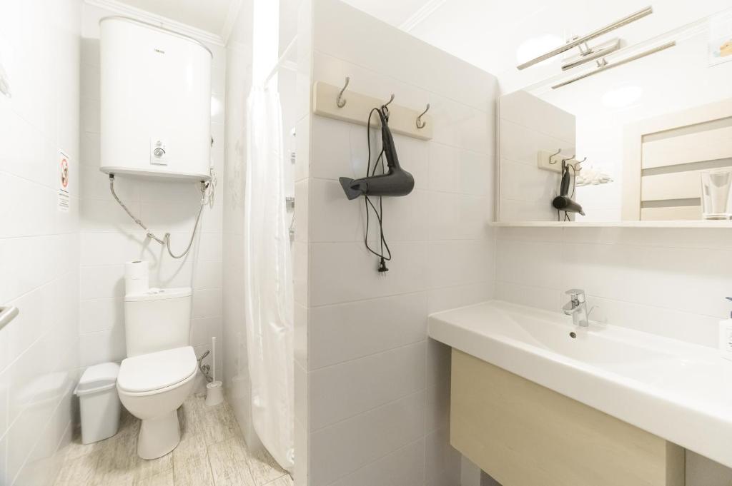 Koupelna v ubytování Prichal 80 Hotel