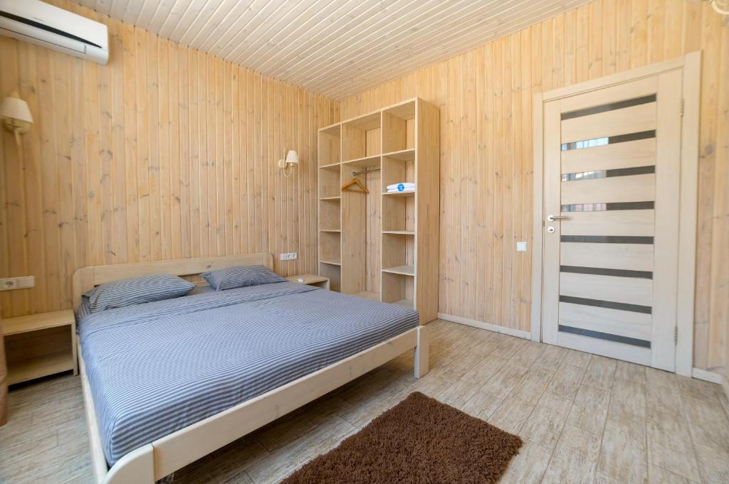 Postel nebo postele na pokoji v ubytování Prichal 80 Hotel
