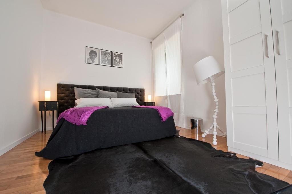 Postel nebo postele na pokoji v ubytování Verona Maison