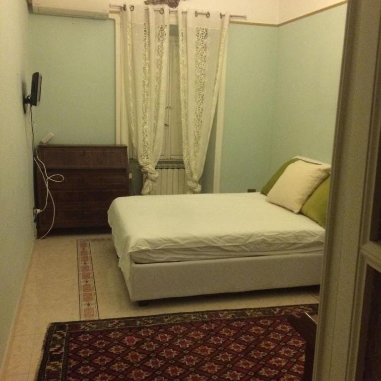 Posteľ alebo postele v izbe v ubytovaní Apt via cernaia center of rome