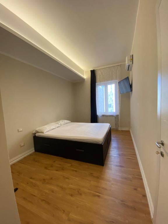 Postel nebo postele na pokoji v ubytování Affittacamere VIA ROMA 12