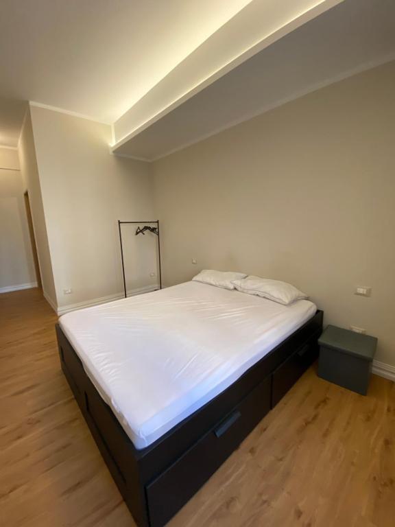 Postel nebo postele na pokoji v ubytování Affittacamere VIA ROMA 12