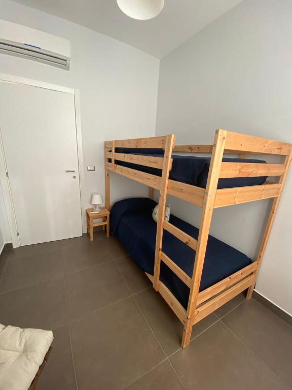 A bed or beds in a room at Il Veliero