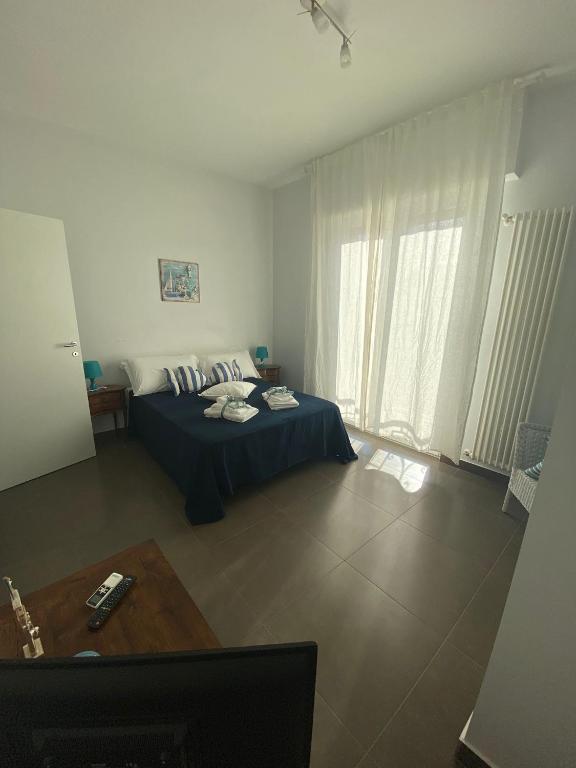 A bed or beds in a room at Il Veliero