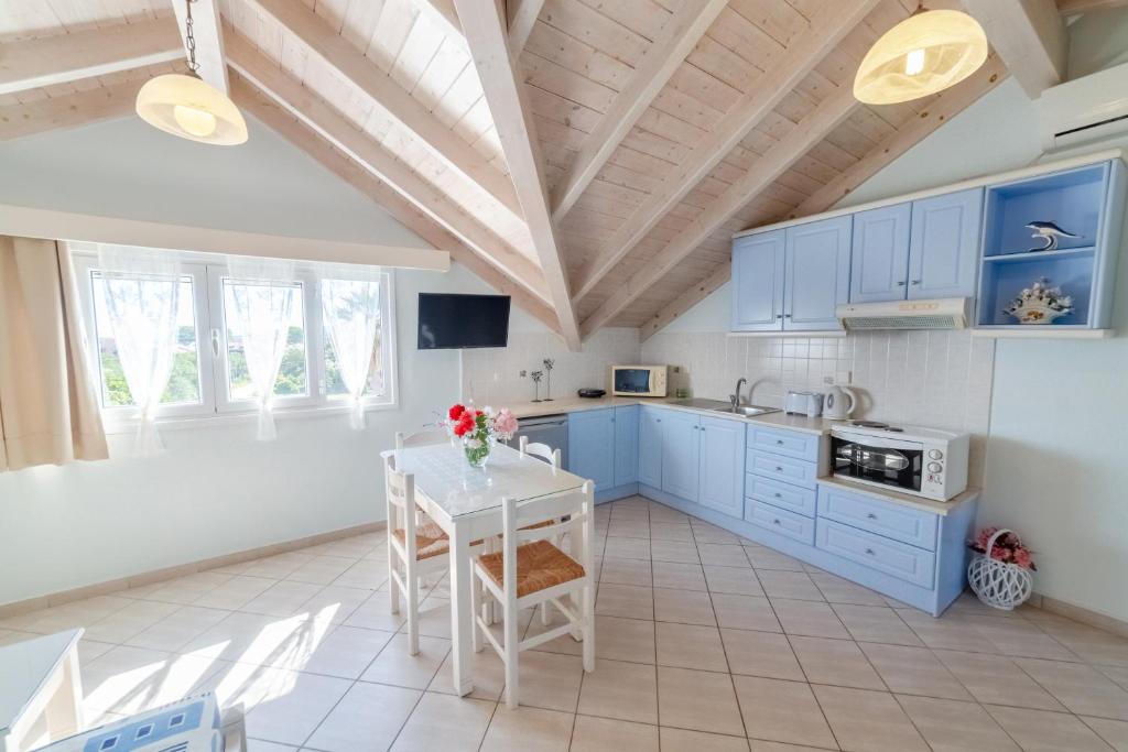 Kuchyň nebo kuchyňský kout v ubytování Angelina Apartments
