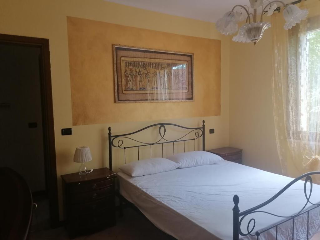 Posteľ alebo postele v izbe v ubytovaní Casa delle Rose Agave