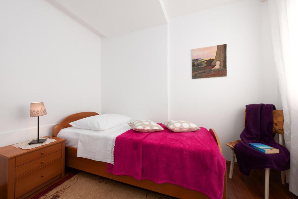 Posteľ alebo postele v izbe v ubytovaní Apartment M-arte