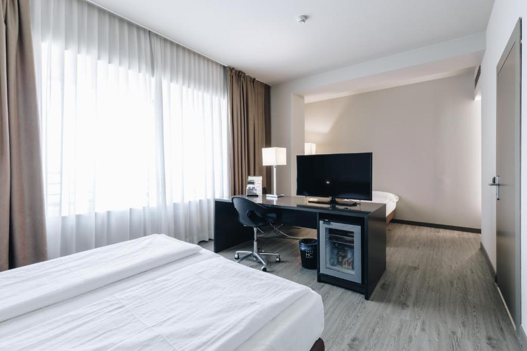Telewizja i/lub zestaw kina domowego w obiekcie Hotel Continental
