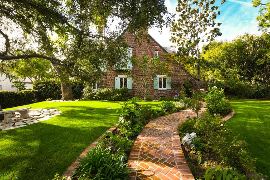 a brick path in front of a house at Beautiful airy architect-designed room and brand new private luxe bathroom in Los Angeles