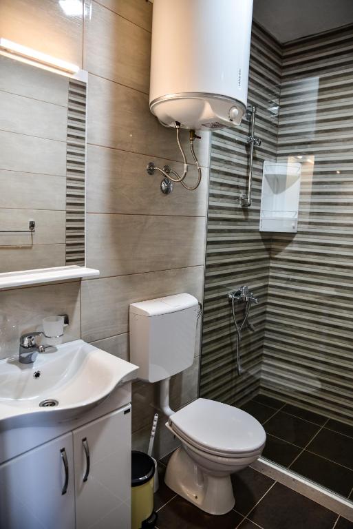 Koupelna v ubytování Casa Sinani