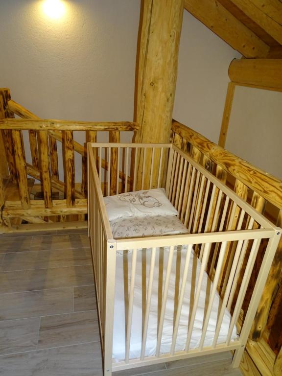 Postel nebo postele na pokoji v ubytování C.T.N. Loghouse