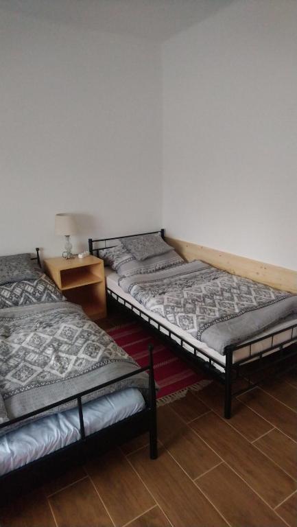 Postel nebo postele na pokoji v ubytování SandorA Vendégház Nagyrákos