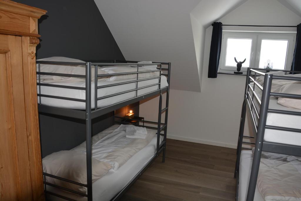 Postel nebo postele na pokoji v ubytování Vakantiehuiswinterberg