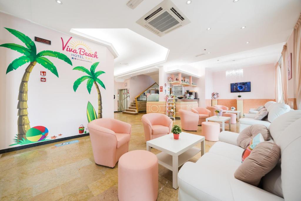 TV a/nebo společenská místnost v ubytování Viva Beach Hotel