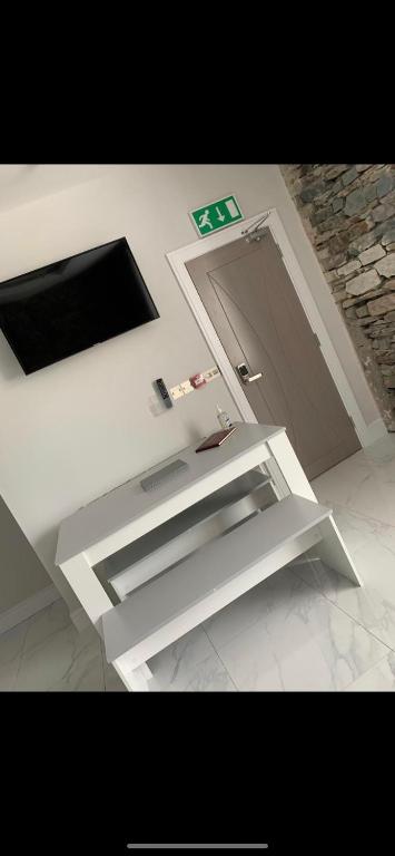 TV a/nebo společenská místnost v ubytování Lisvarna House