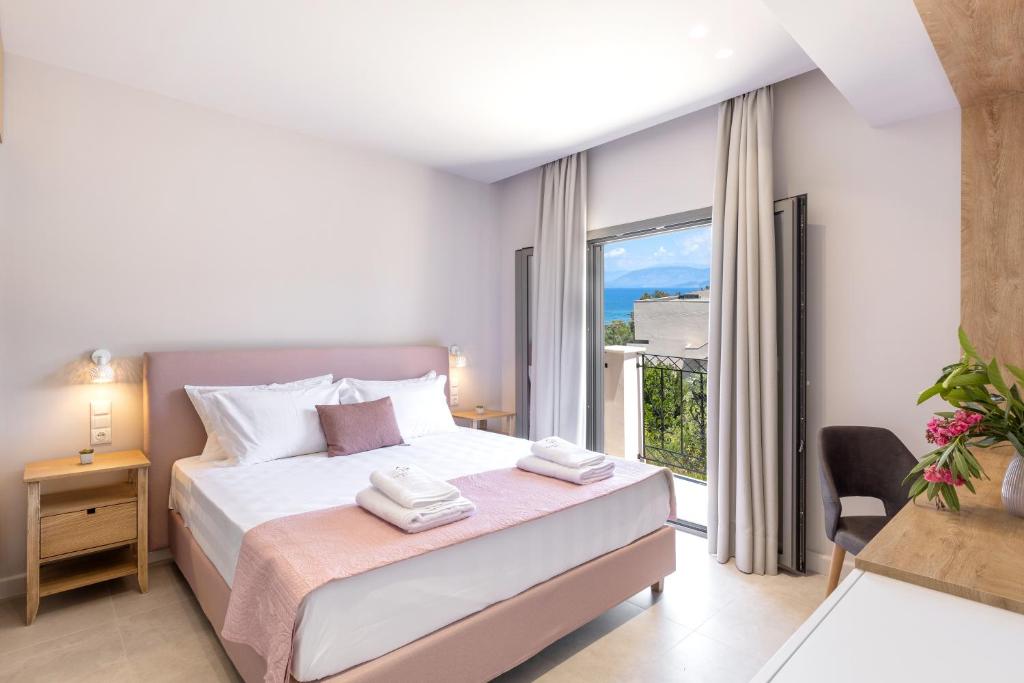 Uma cama ou camas num quarto em Onore Luxury Suites