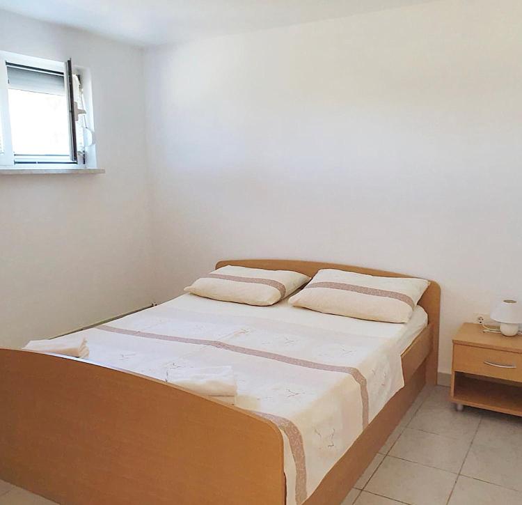 Postel nebo postele na pokoji v ubytování Guesthouse Pejo