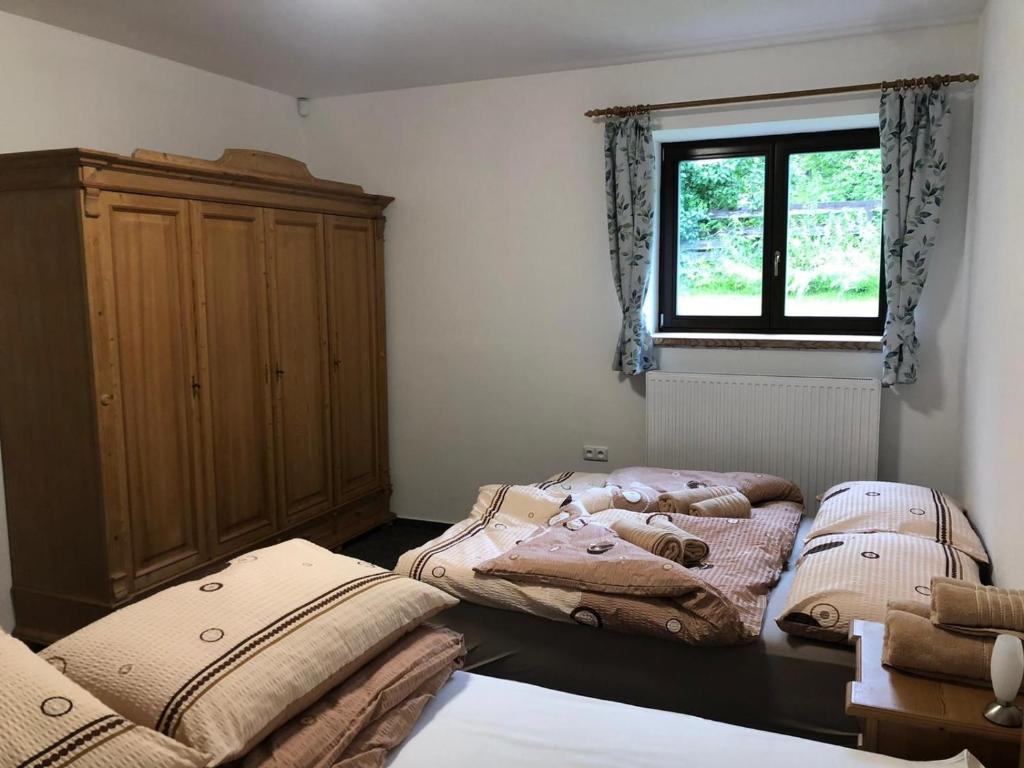 Postel nebo postele na pokoji v ubytování Kubovka 63