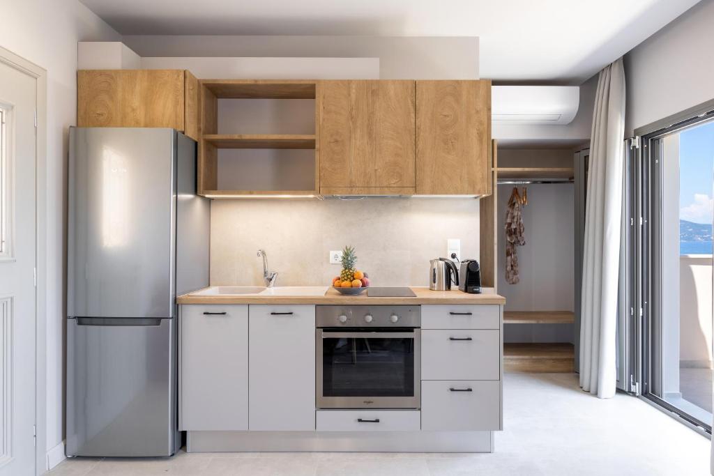 A cozinha ou kitchenette de Onore Luxury Suites