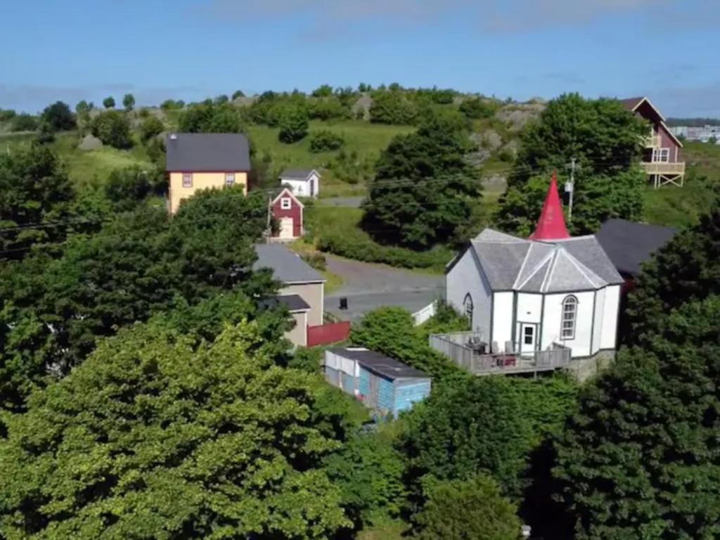 an aerial view of a house with a red roof at Unique Stay! Converted Church In Idyllic Location in St. John's