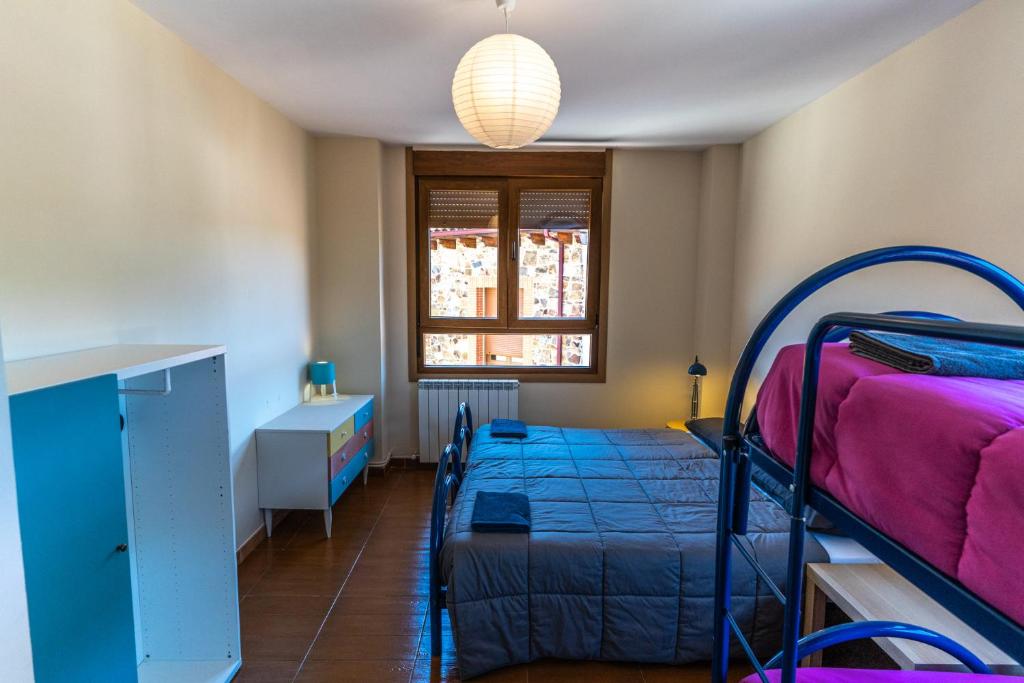 Postel nebo postele na pokoji v ubytování Albergue de Prioro