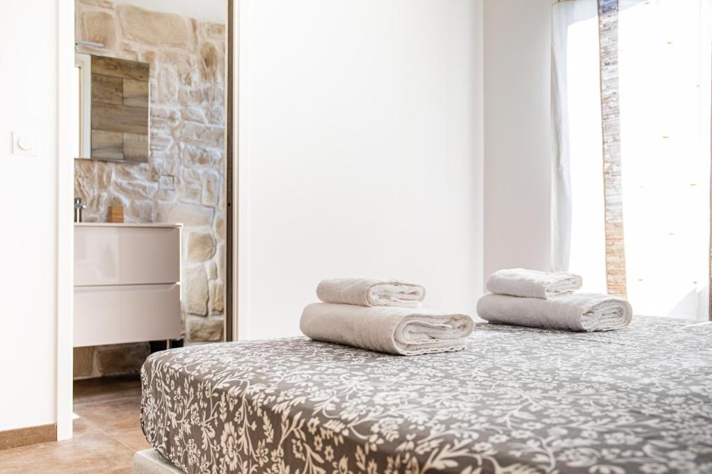 Postel nebo postele na pokoji v ubytování Villa Bianca