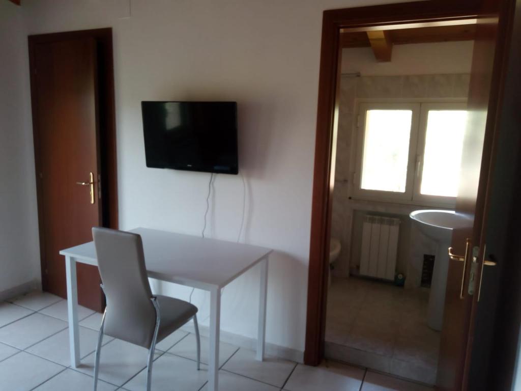 TV a/nebo společenská místnost v ubytování Bed & Breakfast SUITE