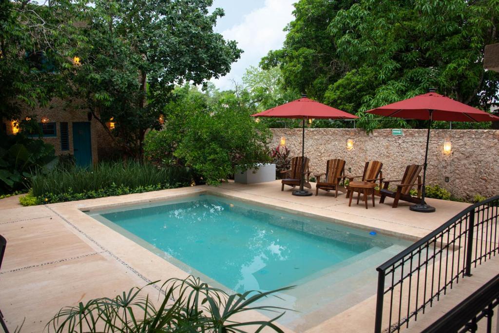 Bazén v ubytování Hotel Posada San Juan nebo v jeho okolí
