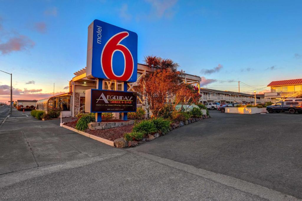 a sign for a walmart in a parking lot at Motel 6-Fort Bragg, CA in Fort Bragg
