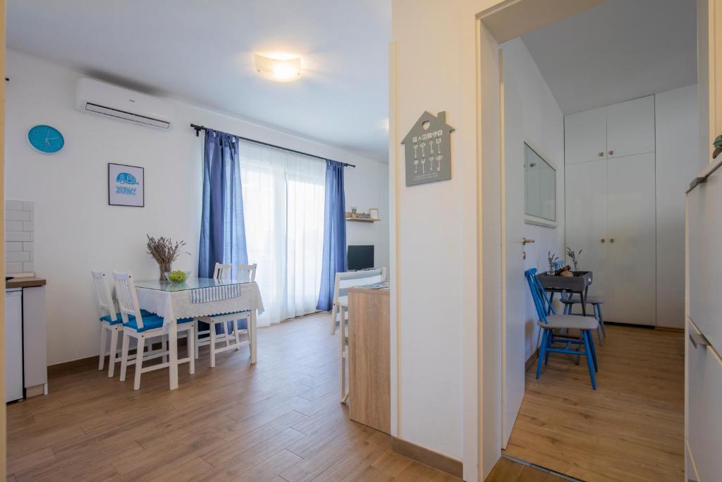 Telewizja i/lub zestaw kina domowego w obiekcie Deep Blue