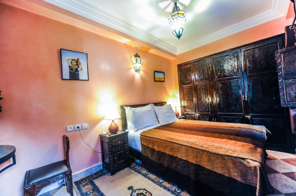 Postel nebo postele na pokoji v ubytování Riad Errabii & Spa