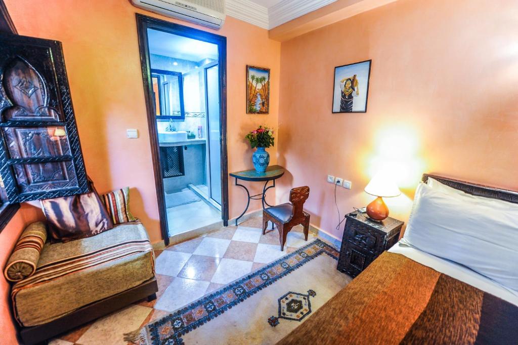 Postel nebo postele na pokoji v ubytování Riad Errabii & Spa