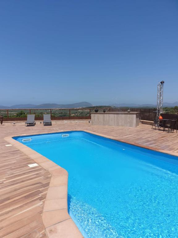 Bazén v ubytování Villa Luna e' Pedra - Suite in Villa con Vista sulla Baia di Alghero e Piscina nebo v jeho okolí