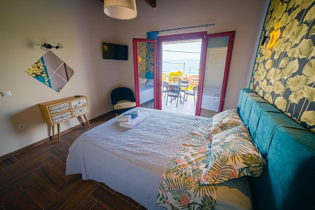 Postel nebo postele na pokoji v ubytování Olive Tree Suites