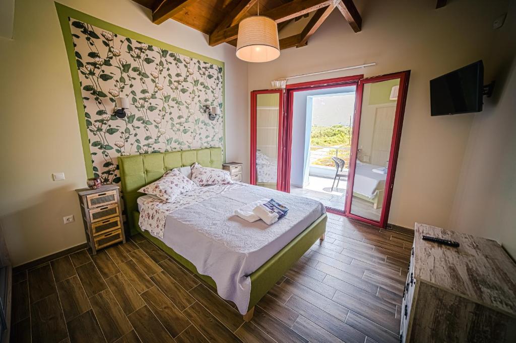 Postel nebo postele na pokoji v ubytování Olive Tree Suites