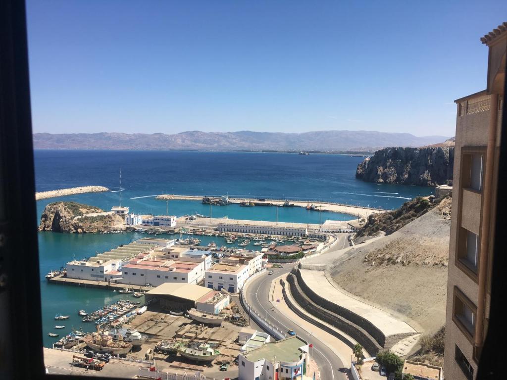 a view of a harbor with a marina at Almarsa4 in Al Hoceïma