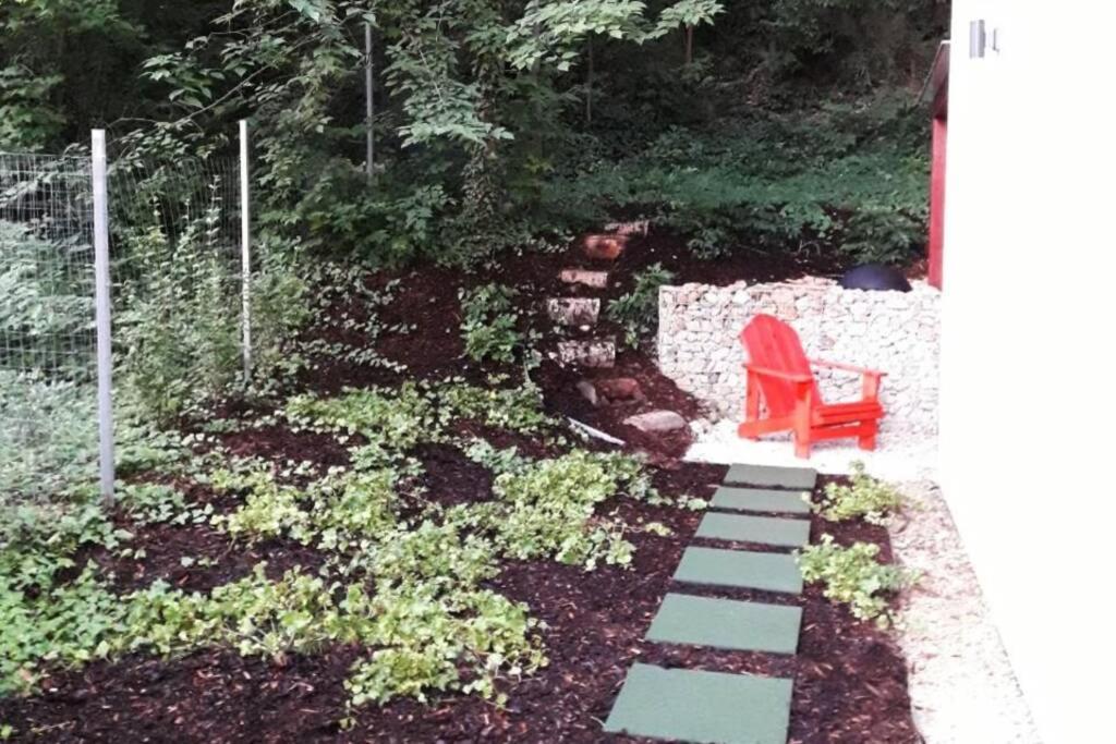 A garden outside Peaceful Designer Home 50 meters from Lake Balaton, Ideal for Families