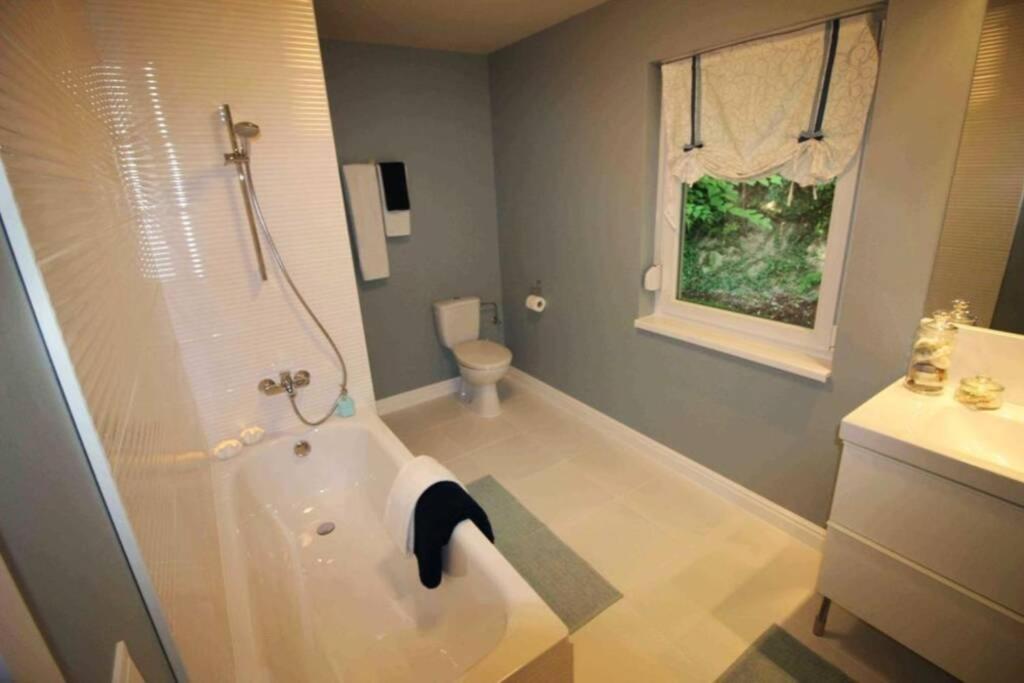 A bathroom at Peaceful Designer Home 50 meters from Lake Balaton, Ideal for Families