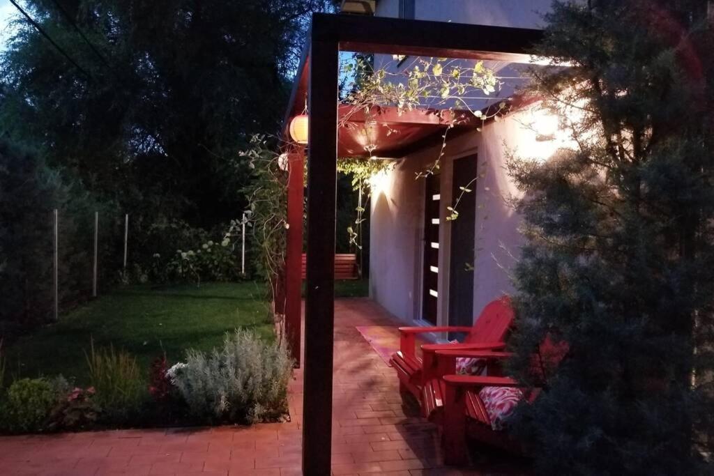 A garden outside Peaceful Designer Home 50 meters from Lake Balaton, Ideal for Families