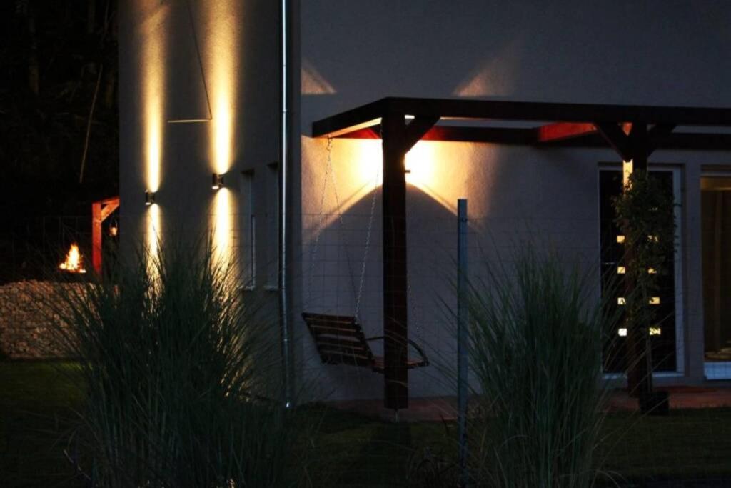 A garden outside Peaceful Designer Home 50 meters from Lake Balaton, Ideal for Families