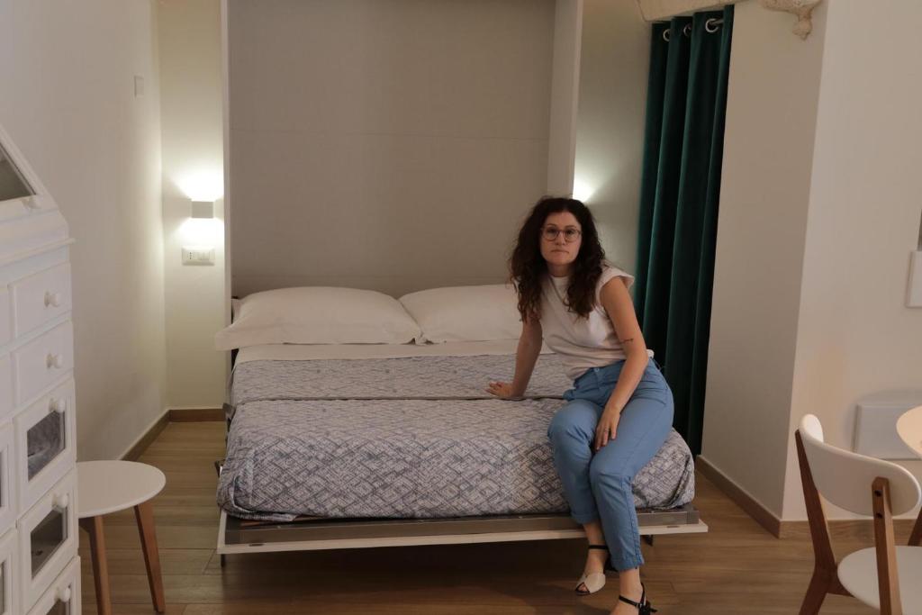 Postel nebo postele na pokoji v ubytování Chianca d l'ora - White Stone Suite